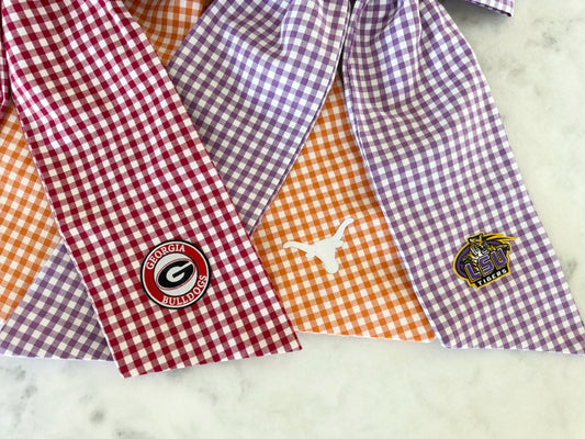 Door Bows with college sports team patches on the end