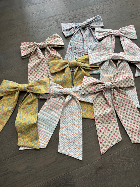 New floral door bows on floor