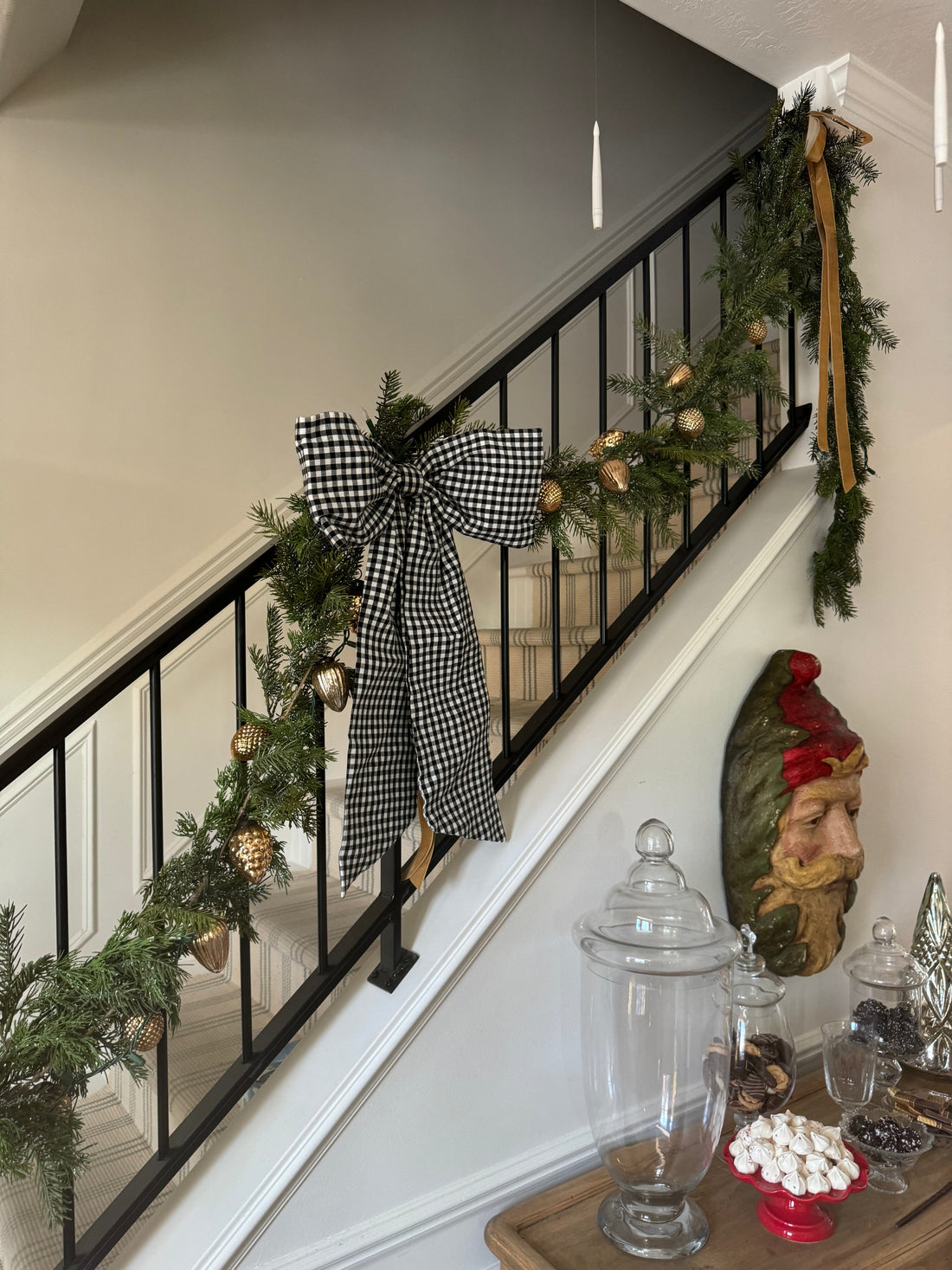 Black gingham bow on a holiday railing