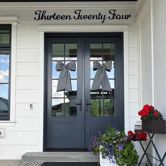 Black door bow decoration